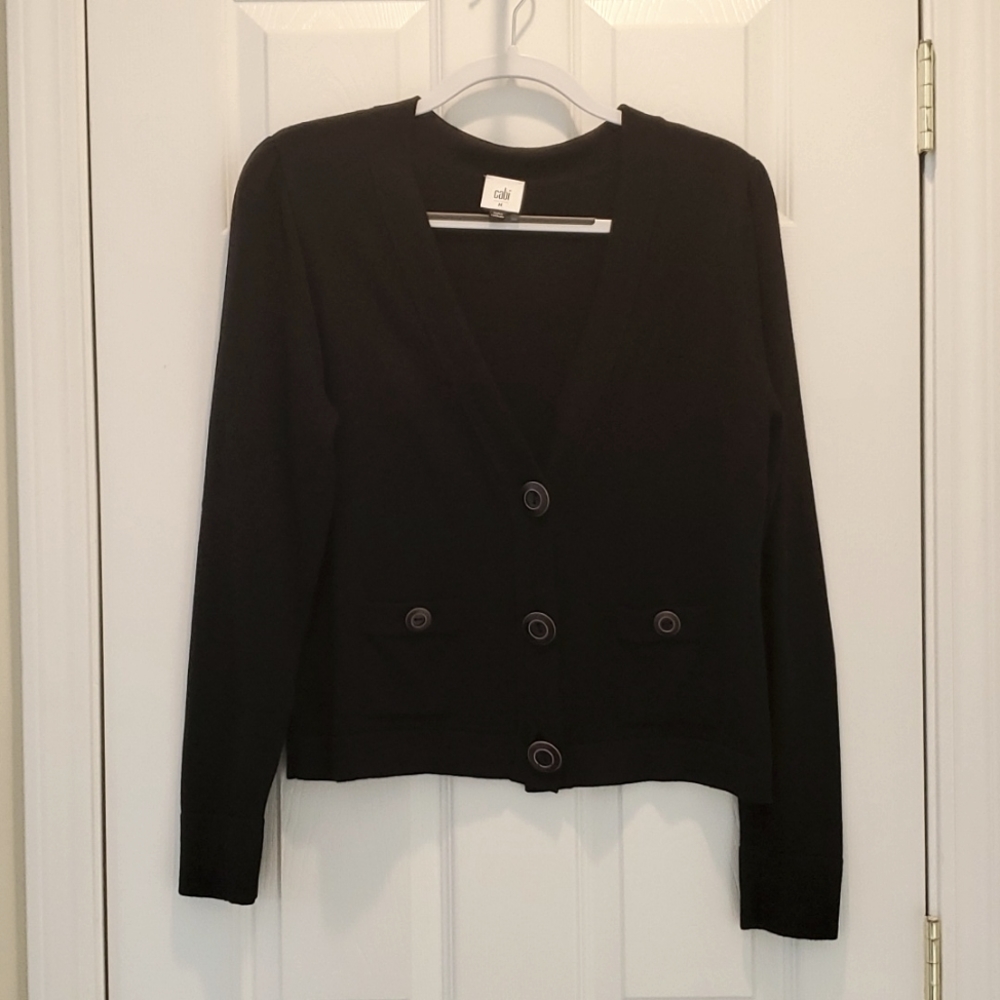 Cabi black cardigan.  slight puff shoulder
